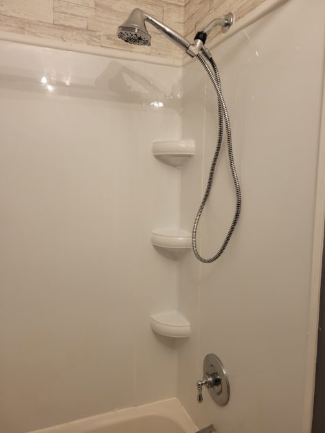 clean bathroom view of shower head