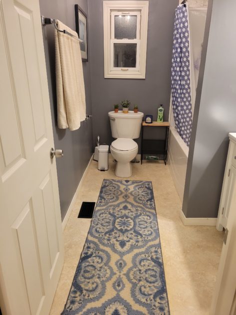clean bathroom view of toilet and shower
