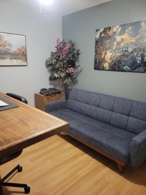 clean home office view of sofa