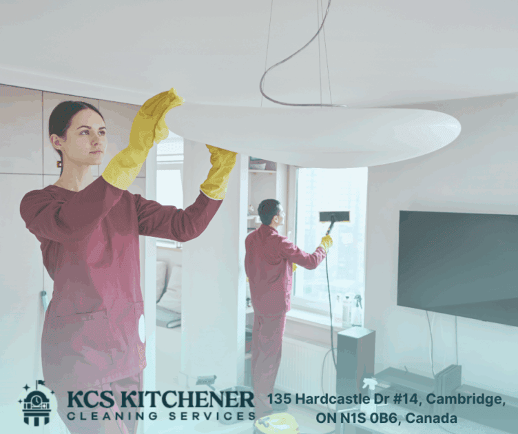 Castio Cleaning Services team deep cleaning a residential home—dusting light fixtures and steam-cleaning windows in Cambridge, Ontario.