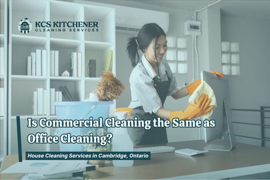 Office cleaning service wiping computer monitor in commercial workspace in Kitchener-Waterloo